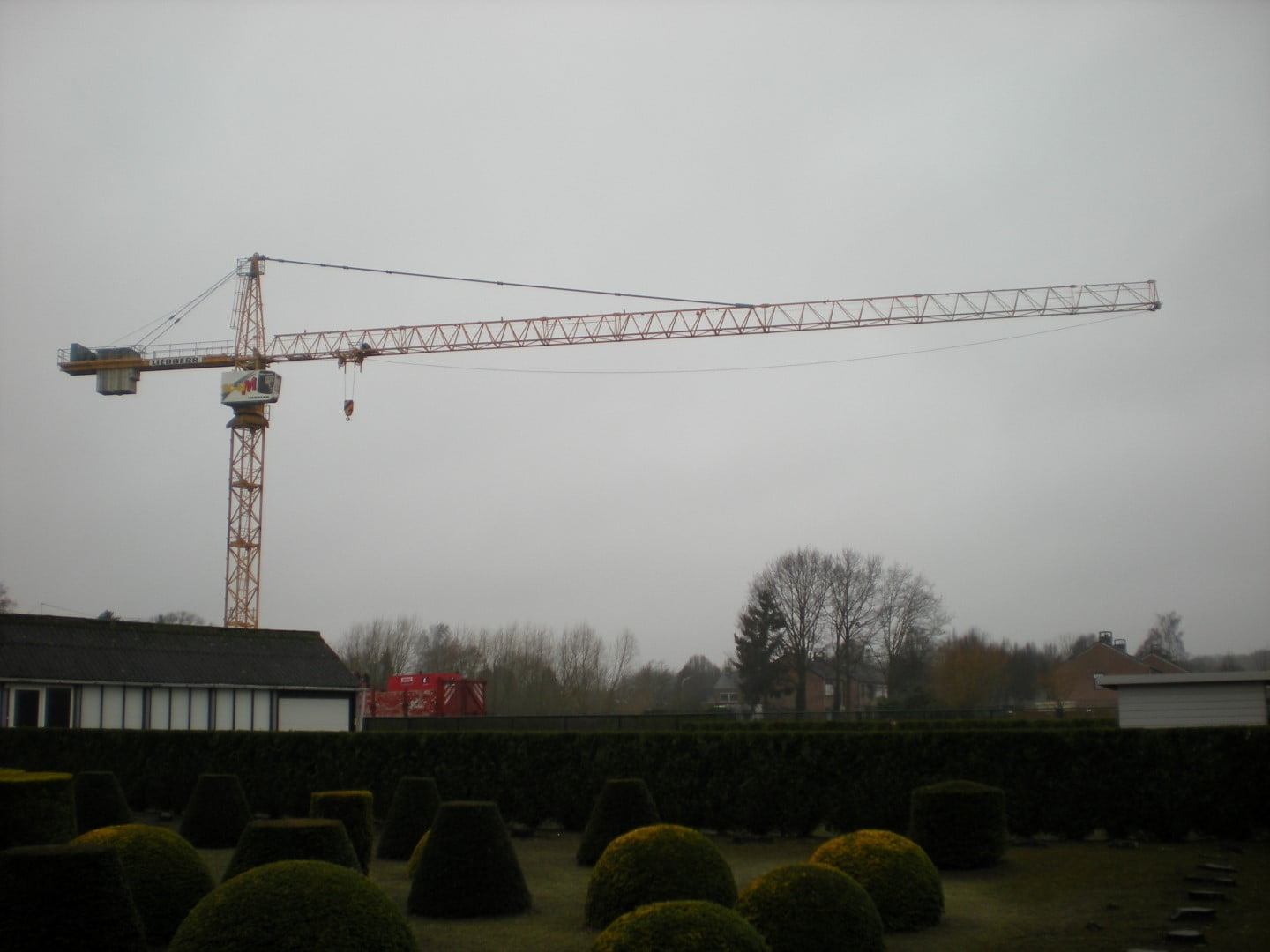 Second-hand tower crane type 200 EC-HM 10 FR.tronic for the company Christiaens at Oostkamp